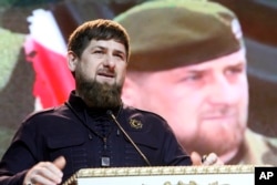 FILE - Chechen regional leader Ramzan Kadyrov speaks as he attends celebrations marking Defenders of the Fatherland Day in Chechnya's provincial capital Grozny, Russia.