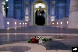 A single rose is left at the door of the Mandalay Bay Resort and Casino in Las Vegas, Oct. 3, 2017. A gunman opened fire on an outdoor music concert on Sunday, resulting in the deadliest mass shooting in modern U.S. history.