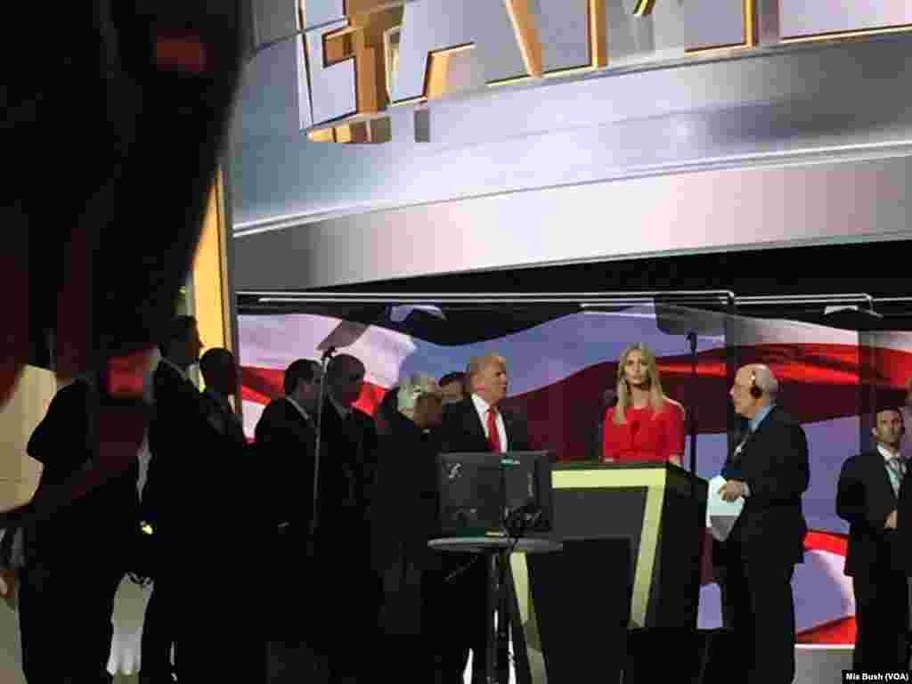Donald Trump, left of podium, and Ivanka Trump, his daughter, arrive at the Quicken Loans Arena for a soundcheck on the fourth day of the Republican National Convention, in Cleveland, July 21, 2016.
