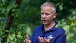 Mass Audubon President David O'Neill takes questions from an Associated Press reporter during an interview in Boston, Wednesday, June 23, 2021.