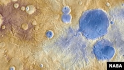 Water-carved valleys on Mars appear to have been caused by runoff from precipitation, likely meltwater from snow. Early Martian precipitation would have fallen on mountainsides and crater rims.