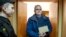 Paul Whelan, a former U.S. Marine, who was arrested in Moscow at the end of last year, arrives for a hearing in a court in Moscow, Russia, Feb. 22, 2019.