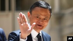 Founder of Alibaba group Jack Ma arrives for the Tech for Good summit, May 15, 2019 in Paris. 