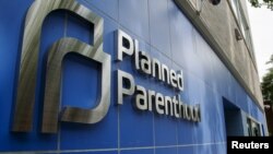 FILE - A sign is pictured at the entrance to a Planned Parenthood building, Aug. 31, 2015. 