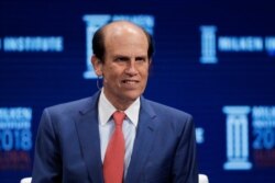 FILE - Financier Michael Milken leads a discussion at the Milken Institute Global Conference in Beverly Hills, Calif., April 30, 2018.