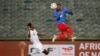 FILE - Namibia's defender Ivan Kamberipa heads the ball away from Kenya's midfielder Duke Abuya during the 2025 Africa Cup of Nations Group J qualifier match between Namibia and Kenya, at Orlando Stadium in Soweto, South Africa, Sept. 10, 2024.