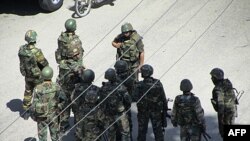 Sirijski vojnici na ulicama jednog od gradova u kojima već nedeljama traju anti-vladini protesti