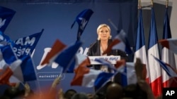 Far-right candidate for the presidential election Marine Le Pen speaks during a campaign meeting in Arcis-sur-Aube, near Troyes, France, April 11, 2017. Le Pen argues that Muslim immigration and economic globalization are destroying France's identity.