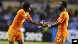 Gervinho et Yaya Touré, 2012
