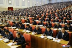 Attendees of the 5th Plenary Meeting of the 7th Central Committee of the Workers' Party of Korea are seen in this undated photo released Dec. 29, 2019, by North Korean Central News Agency.