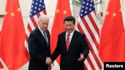 ამერიკის ვიცე პრეზიდენტი ჯო ბაიდენი და ჩინეთის პრეზიდენტი სი ძინპინი 