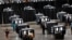 People cast their ballots during early voting for the upcoming presidential elections inside of The Atlanta Hawks' State Farm Arena in Atlanta, Georgia, U.S., October 12, 2020.