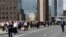 Commuters accross London Bridge after is was reopened following an attack which left 7 people dead and dozens of injured in central London, Britain, June 5, 2017. 