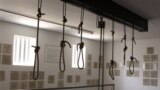 In this photo taken Thursday, Dec 8. 2011, nooses hang in the gallows at the Pretoria Central Prison. The gallows now serve as a monument to those who were executed before executions were stopped in 1989 