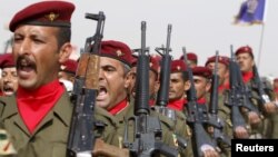 Soldiers march during their graduation ceremony at an Iraqi army base in Camp Taji in Baghdad, Feb. 21, 2016