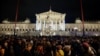 People attend a protest against the Freedom Party after general elections in Vienna, Austria, Oct. 3, 2024. 