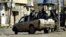 FILE - This undated file image posted on a militant website on Tuesday, Jan. 14, 2014 shows fighters from the al-Qaida linked Islamic State of Iraq and the Levant (ISIL) patrolling in Raqqa, Syria.