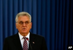 Serbian President Tomislav Nikolic addresses the press after talks with his Macedonian counterpart Gjorge Ivanov, in Belgrade, Serbia, Oct. 28, 2016.