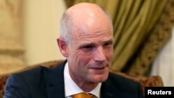 FILE - Dutch Foreign Minister Stef Blok attends a meeting with Egypt's Foreign Minister Sameh Shoukry in Cairo, Egypt, May 10, 2018. On Thursday, Suriname protested his remark that it was a "failed state."