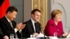 中国国家主席习近平、法国总统马克龙、德国总理默克尔在法国巴黎爱丽舍总统府举行新闻发布会(2019年3月26日)
