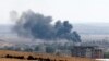 Kurd Fighters Hold Off IS Assault on Syrian Town