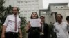 Fearing Secret Trial, Activists' Friends Protest China Court