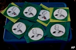Souvenirs of Eva Peron are displayed for sale on a table at a square in Los Toldos, Argentina, May 6, 2019.