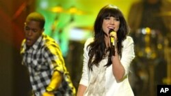 FILE - This Nov. 18, 2012 file photo shows Carly Rae Jepsen performing at the 40th Annual American Music Awards in Los Angeles. The song put 27-year-old Jepsen, who finished third on a season of "Canadian Idol,” in the spotlight and on a path to potential