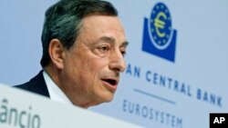 FILE - President of European Central Bank Mario Draghi speaks during a press conference of the ECB in Frankfurt, Germany, April 15, 2015. 