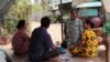 Tuk-tuk driver Hy Sokhom, 50, who is wearing a face mask, struggles to pay off his debt during the COVID-19 pandemic, Kien Svay district, Kandal province, Cambodia, April 12, 2020. (Phorn Bopha/VOA Khmer)