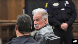 Pastor Terry Jones, right, and Wayne Sapp react to the jury's verdict, that both of them are likely to cause a breach of the peace with their proposed protest against at the Islamic Center of America in Dearborn, Mich., April 22, 2011