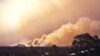 Australia Firefighters Battle Hot, Windy Conditions