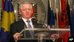 FILE - Kosovo's Skender Hyseni, who at the time was his country's foreign minister, speaks at a news conference during a visit to Tirana, Albania, April 19, 2010.