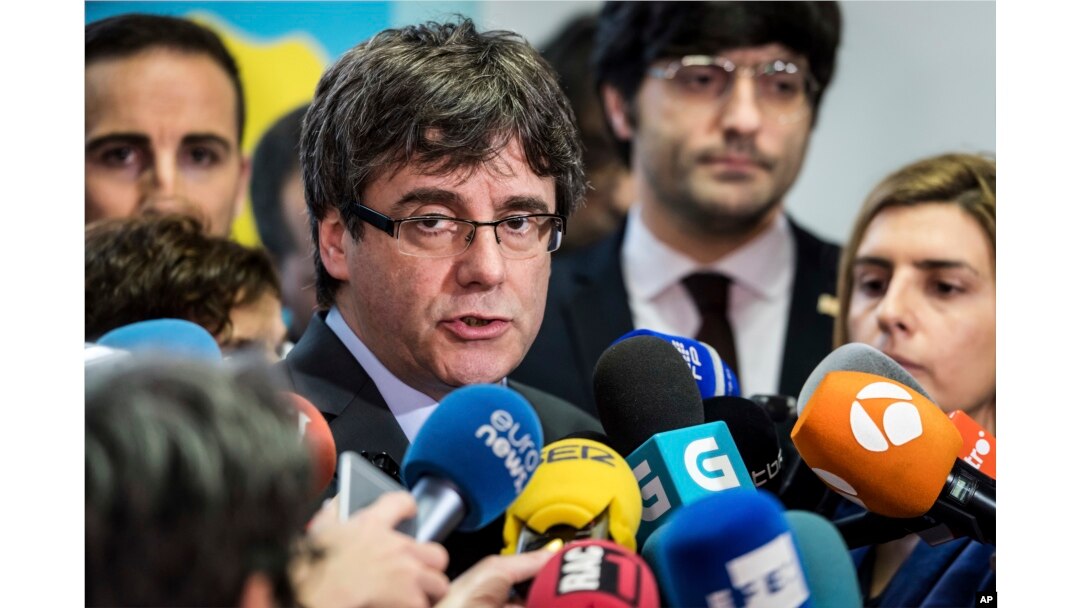 Fugitive Catalan leader Carles Puigdemont addresses the media in Brussels, Belgium, Jan. 24, 2018.