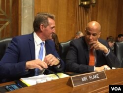 UMnu. Cory Booker loMnu. Jake Flake bedale leSenate.