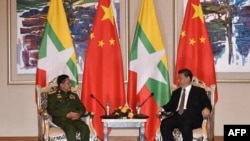 中国国家主席习近平18日会晤缅甸军方领导人敏昂来。