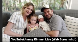 Jimmy Kimmel poses for a photo with his family after his new son, Billy, came home from the hospital.