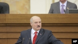 Belarussian President Alexander Lukashenko addresses the Parliament during an annual state of the nation speech in Minsk, April 21, 2011