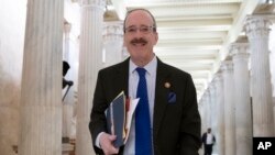 House Foreign Affairs Committee Chair Eliot Engel, D-N.Y., walks through the Hall of Columns at the Capitol as House Democratic chairs gather for a meeting with Majority Leader Steny Hoyer, D-Md., in Washington, March 27, 2019.