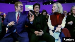 Actor Cate Blanchett, actor Shah Rukh Khan and singer Elton John are pictured at the Crystal Awards ceremony of the annual meeting of the World Economic Forum (WEF) in Davos, Switzerland, Jan. 22, 2018. 