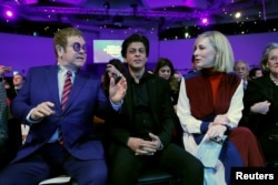 Actor Cate Blanchett, actor Shah Rukh Khan and singer Elton John are pictured at the Crystal Awards ceremony of the annual meeting of the World Economic Forum (WEF) in Davos, Switzerland, Jan. 22, 2018.