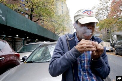 smoking cigarettes in public Is park a constitutional right? Supreme Court refuses case Outdoor smoking area with people
