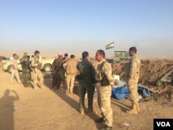 Some peshmerga soldiers say that although they are defeating Islamic State militants, they need better weapons and more support from the international coalition, near Bashika in Kurdish Iraq, Oct. 31, 2016. (H. Murdock/VOA)