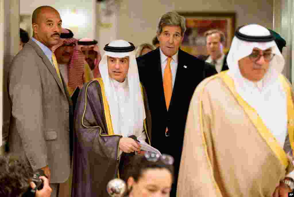U.S. Secretary of State John Kerry and Saudi Foreign Minister Adel al-Jubeir (center left) arrive for a joint news conference at Riyadh Air Base in Saudi Arabia,&nbsp; May 7, 2015.