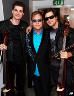 The duo, 2Cellos, with Sir Elton John