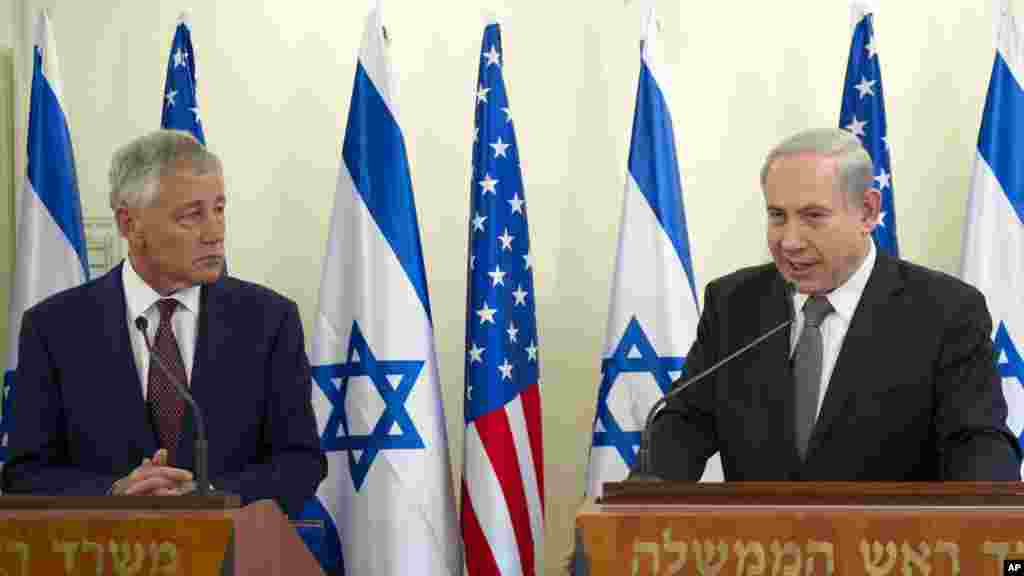 U.S. Secretary of Defense Chuck Hagel listens at a joint press conference with Israeli Prime Minister Benjamin Netanyahu at the latter&#39;s office in Jerusalem, April 23, 2013.