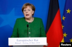 German Chancellor Angela Merkel attends a news conference at a European Union leaders summit in Brussels, Belgium, March 23, 2018.