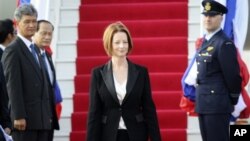 Australia's Prime Minister Julia Gillard arrives at Wattay International Airport in Vientiane, Laos, Sunday, Nov. 4, 2012. Gillard is scheduled to attend the Asia-Europe Meeting (ASEM) on Monday and Tuesday. (AP Photo/Sakchai Lalit)