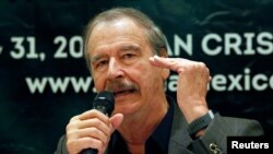 Former Mexican President Vicente Fox gestures during a news conference to announce the cannabis forum CannaMexico World Summit in Mexico City, April 11, 2018.