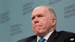 FILE - CIA Director John Brennan pauses while speaking, Council on Foreign Relations, March 11, 2014.